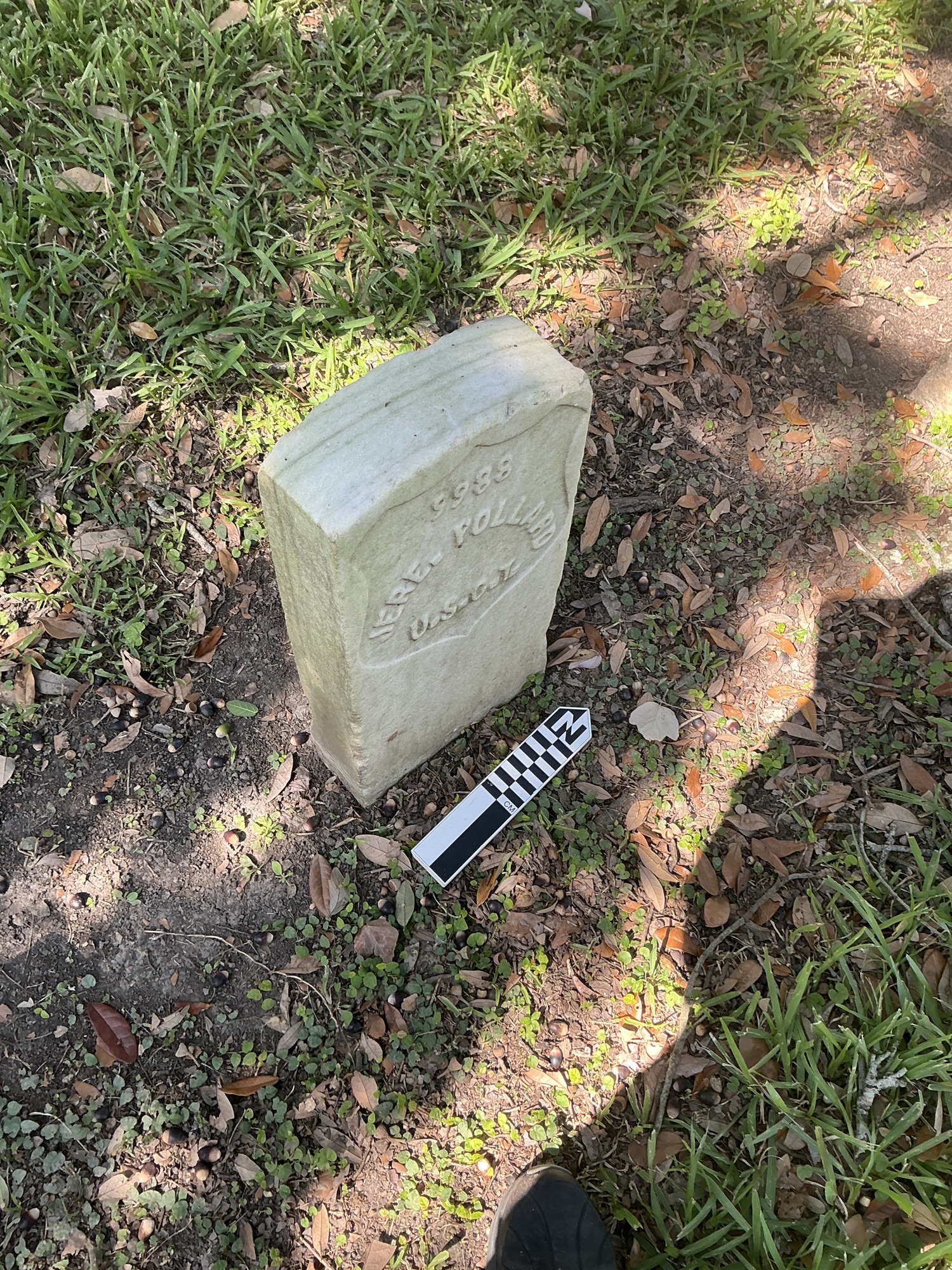Extra image of historic upright marble headstone with recessed shield face.