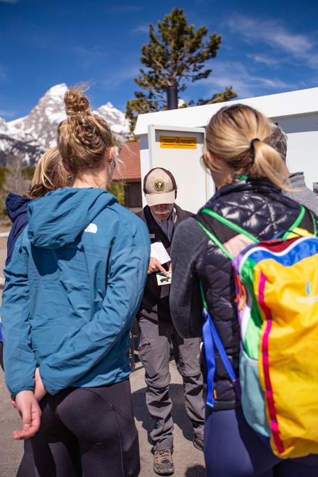 Volunteer shares information with a group