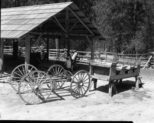 Ed. Whittmore in background. Columbia running gear-washburn body