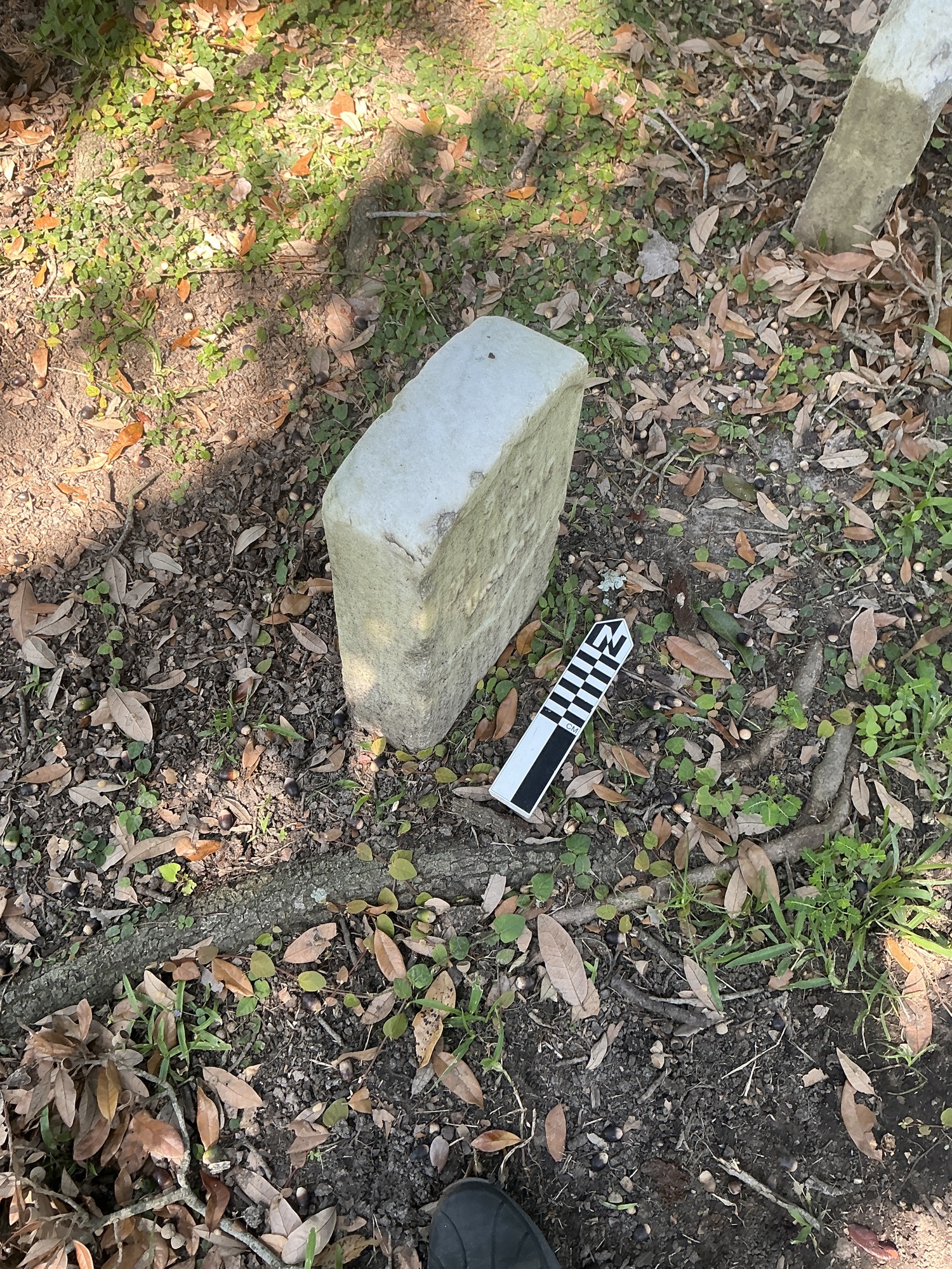 Extra image of historic upright marble headstone with recessed shield face.