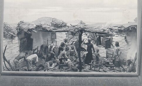 historic photo of Rebellion diorama with original exhibit text below