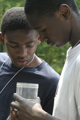 Resident program-Roles and Residences Pond Exploration Looking at Finds