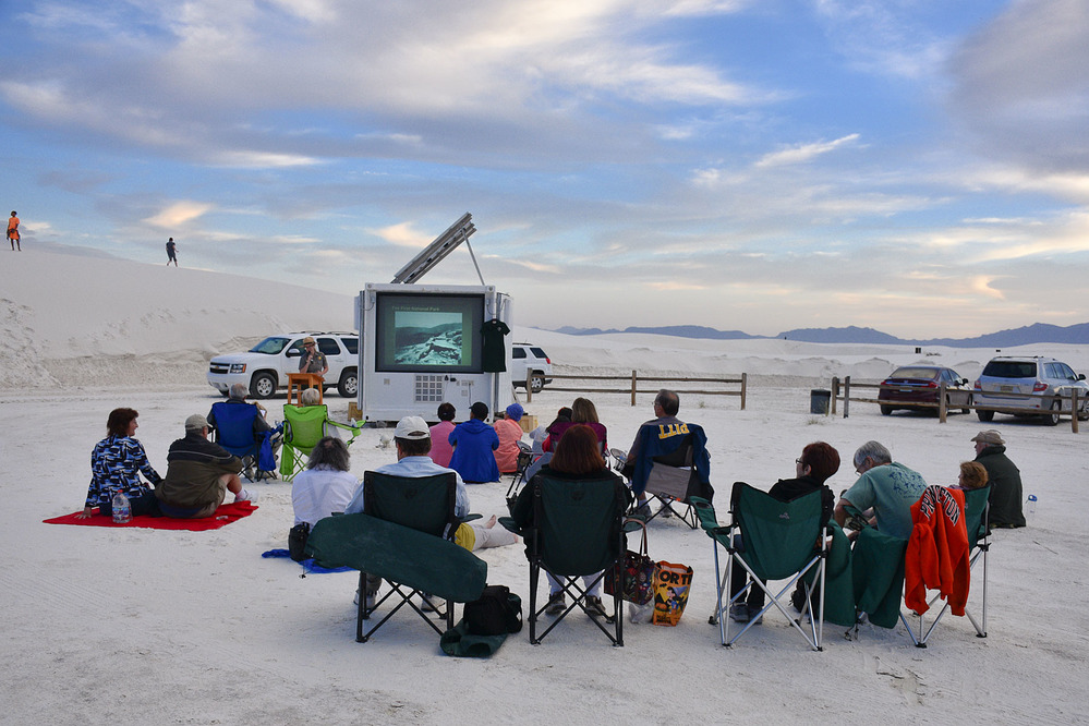 A ranger provides an evening talk at the amphitheater in the dunes.