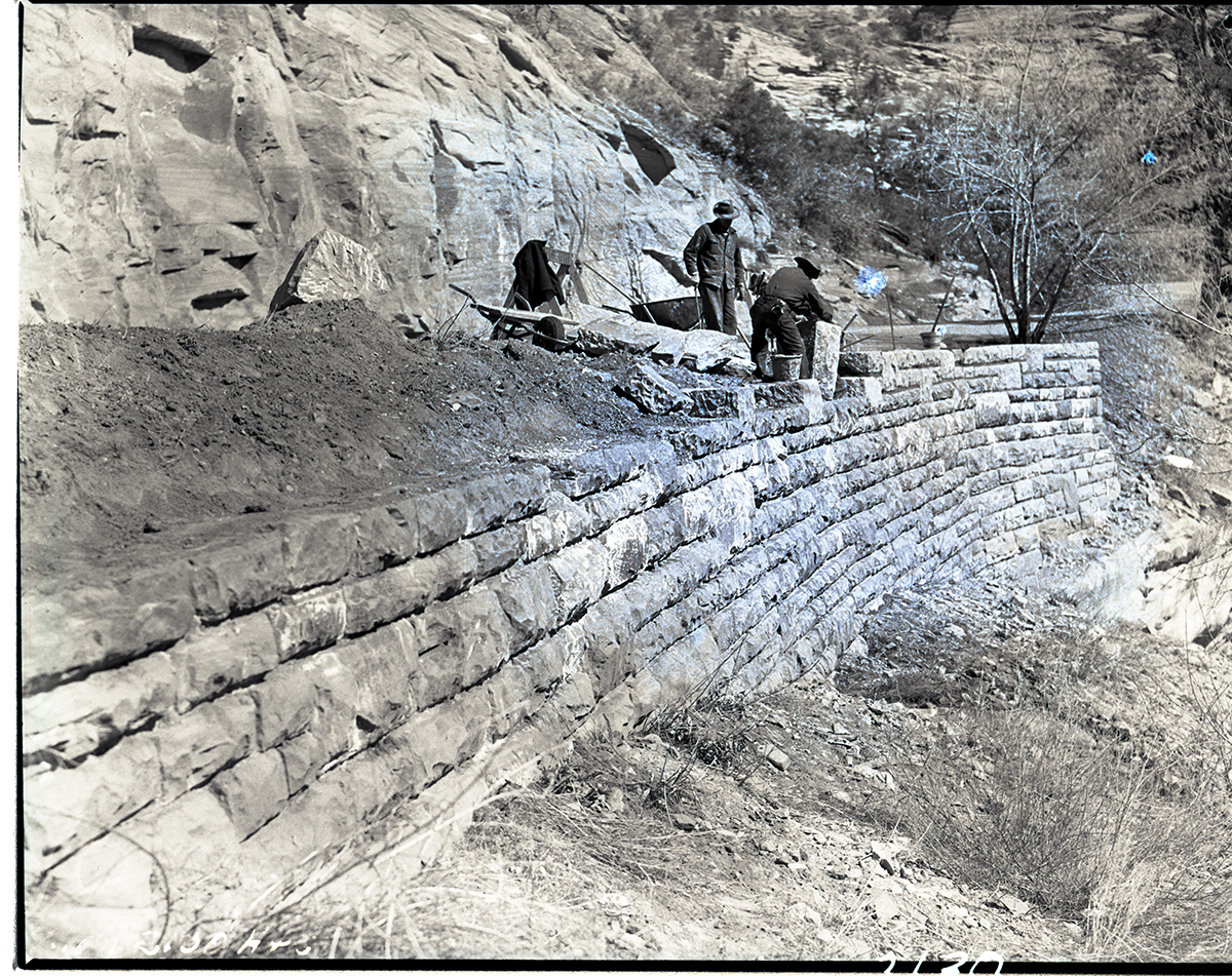 Workers building a retaining wall on park road east of the tunnel, Works Progress Administration (WPA) Civilian Conservation Corps (CCC) project.