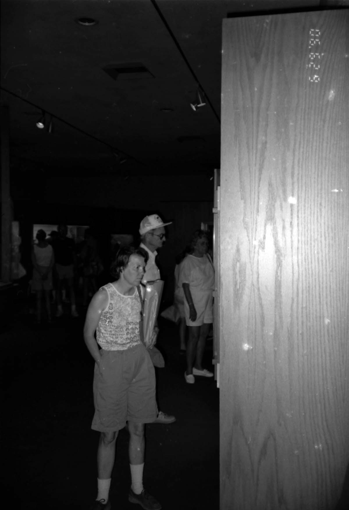Visitors viewing the interpretive display in the old Mission 66 Visitor Center and Museum.