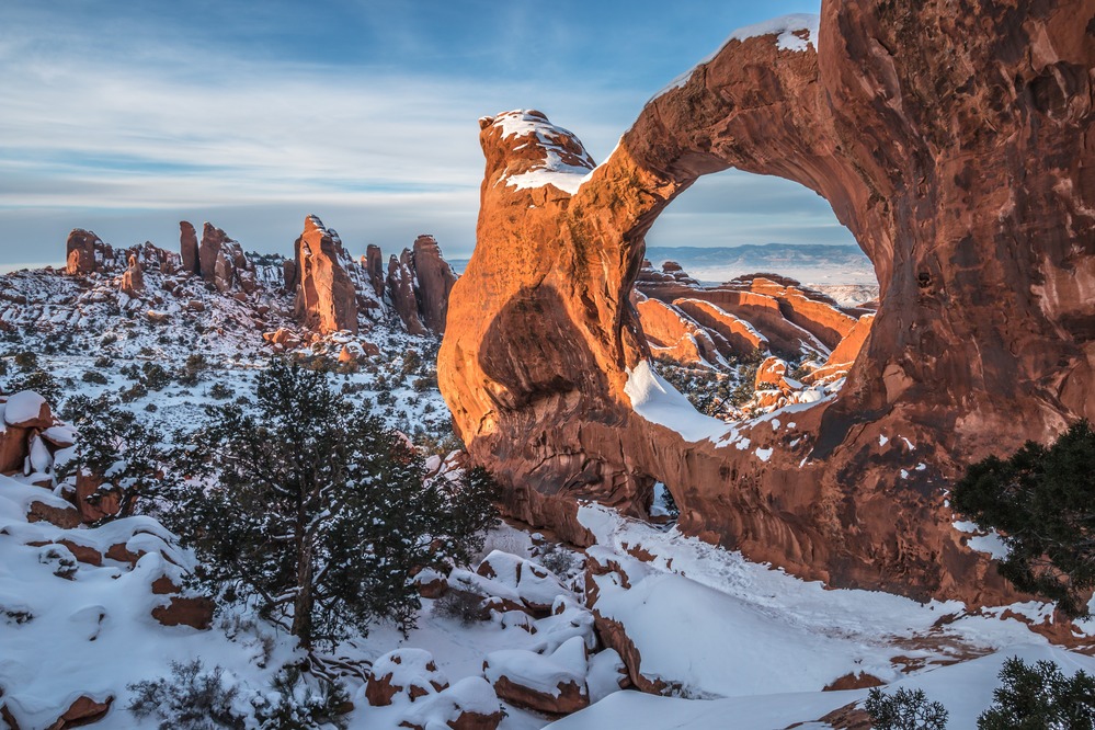 Double O Arch Snowy Sunset