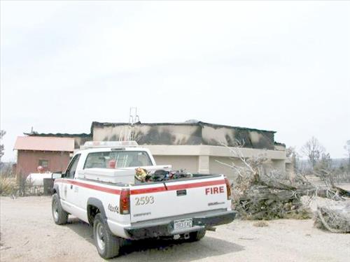 Fire damage to the water tank structure from the Long Mesa Fire, Mesa Verde National Park, July-August 2002