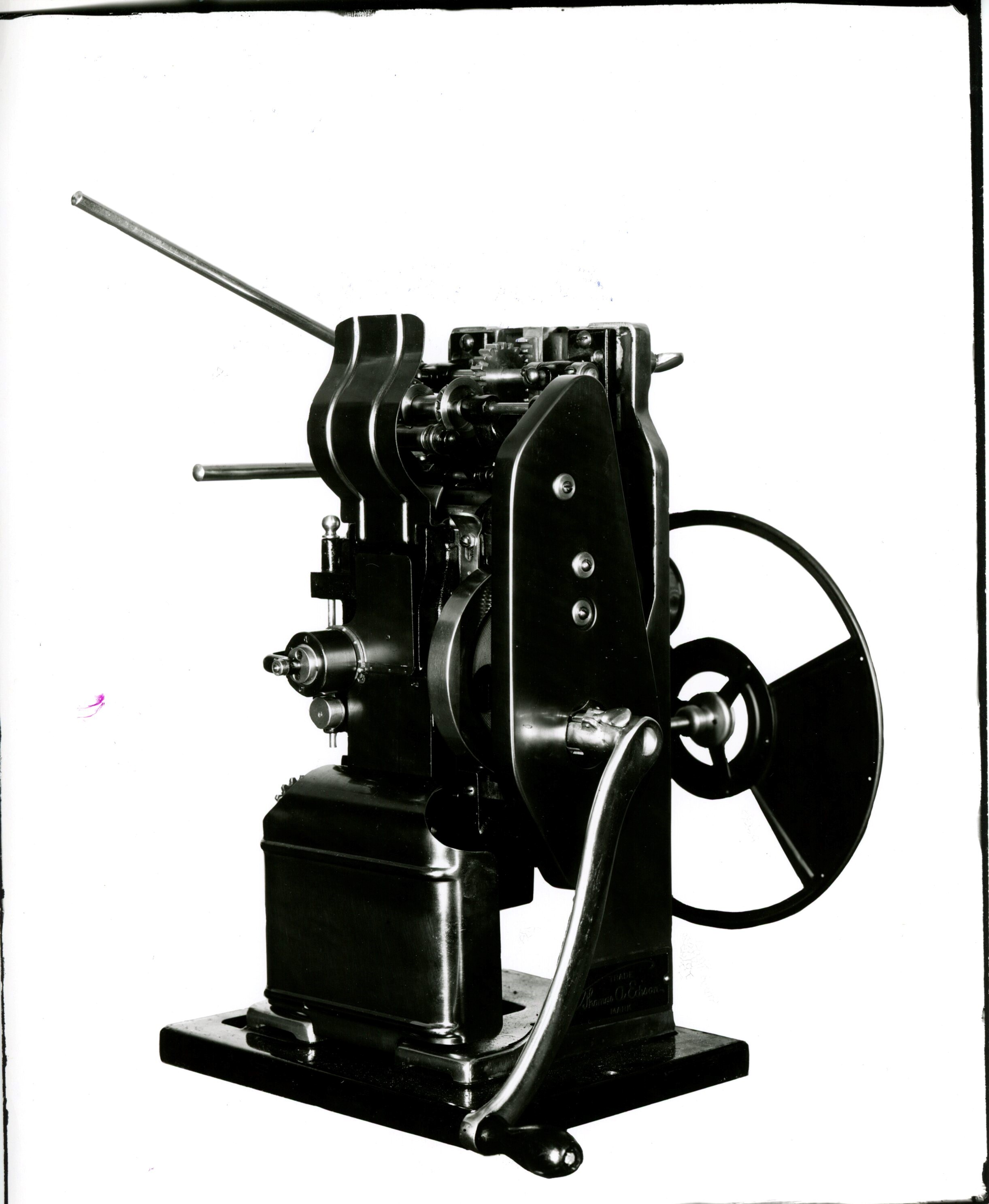 Edison projecting kinetoscope, head, helical gear, guard in place.