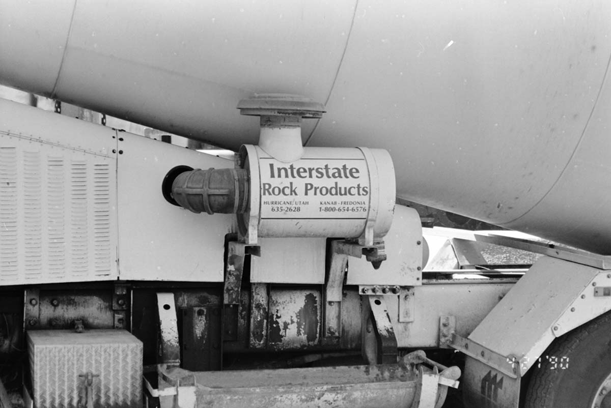 Close up of cement truck by 'Interstate Rock Products' used during the construction of headquarters addition.