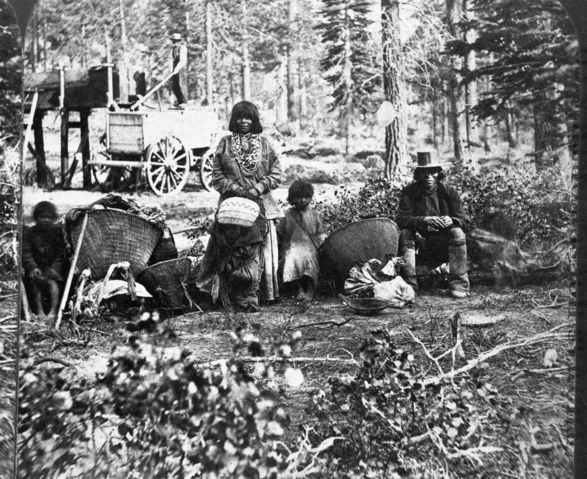 Copy Neg: July 1985 by Michael Dixon. Detail of Stereograph RL-16,571. Native American family group. Caption: "Central Pacific Railroad. 598. Group of Digger Indian Squaws." Near Tahoe or Donner Pass.