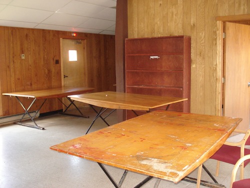 This is a multi-purpose space connected to the dining hall. The door on the right leads to another small room.