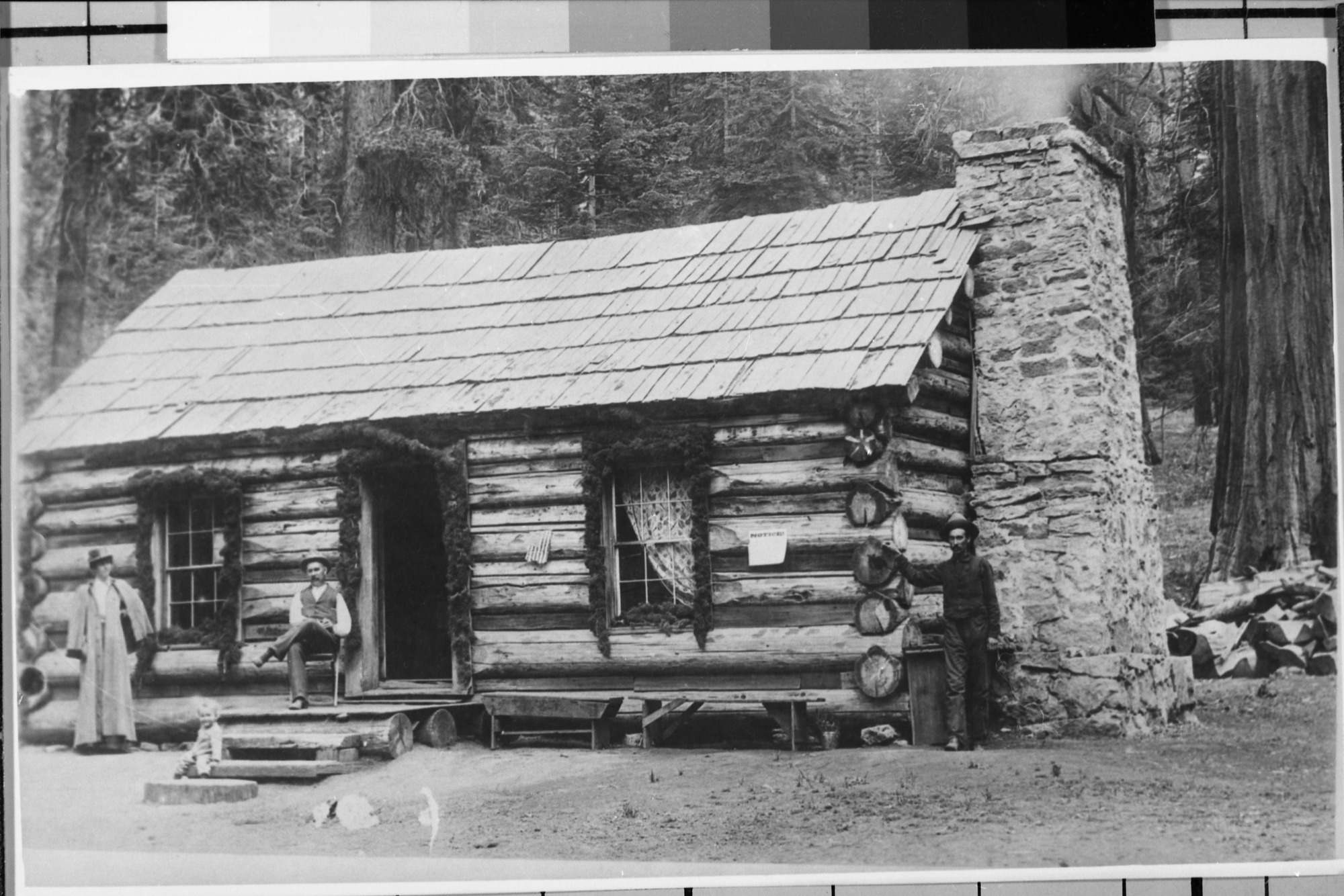 Mariposa Big Trees Cabin - built in 1885. Report of Commissioners for Yosemite Valley and Mariposa Grove of Big Trees, 1886, says "Last year a comfortable and artistic log cabin was erected --- in the grove." Original print in the over-sized photo drawer in RL. Copy Neg: J. Ernest, 1983.