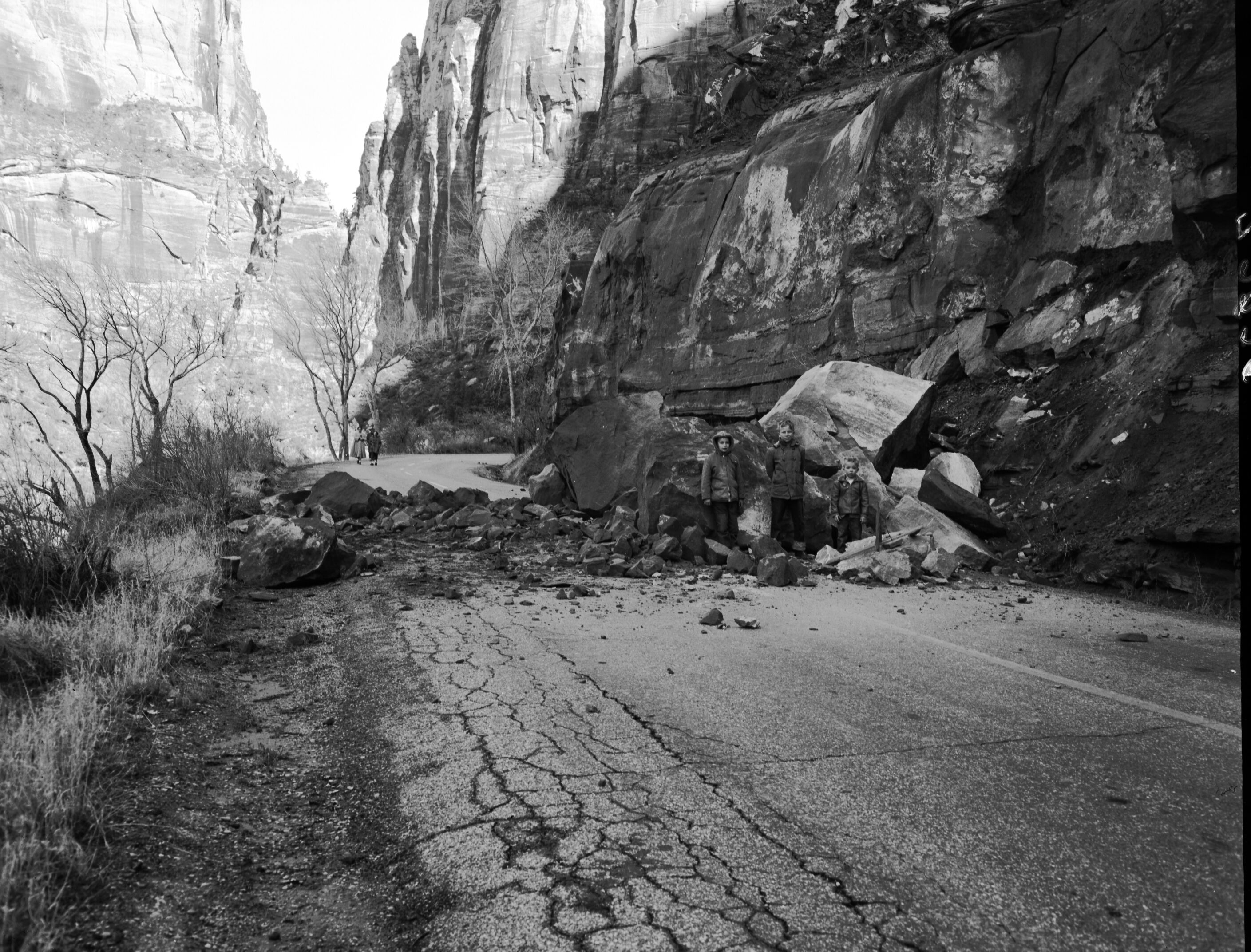 Rock slide valley road a half mile north of Grotto Campground. Looking down canyon [scratches, pits]
