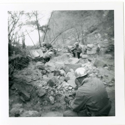 Workers repairing trail damage on the Hidden Canyon trail.