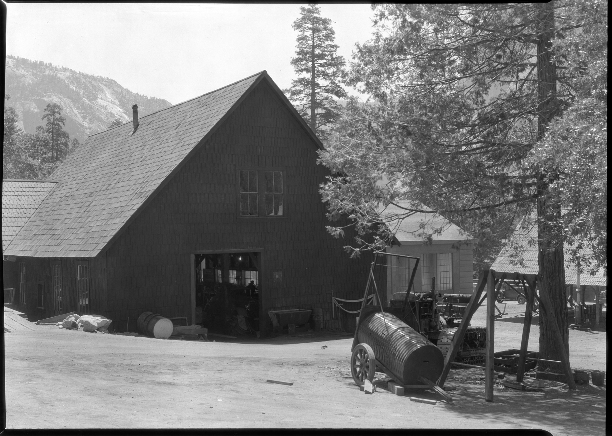 Old machine shop from the rear before removal. RHA (ECW).