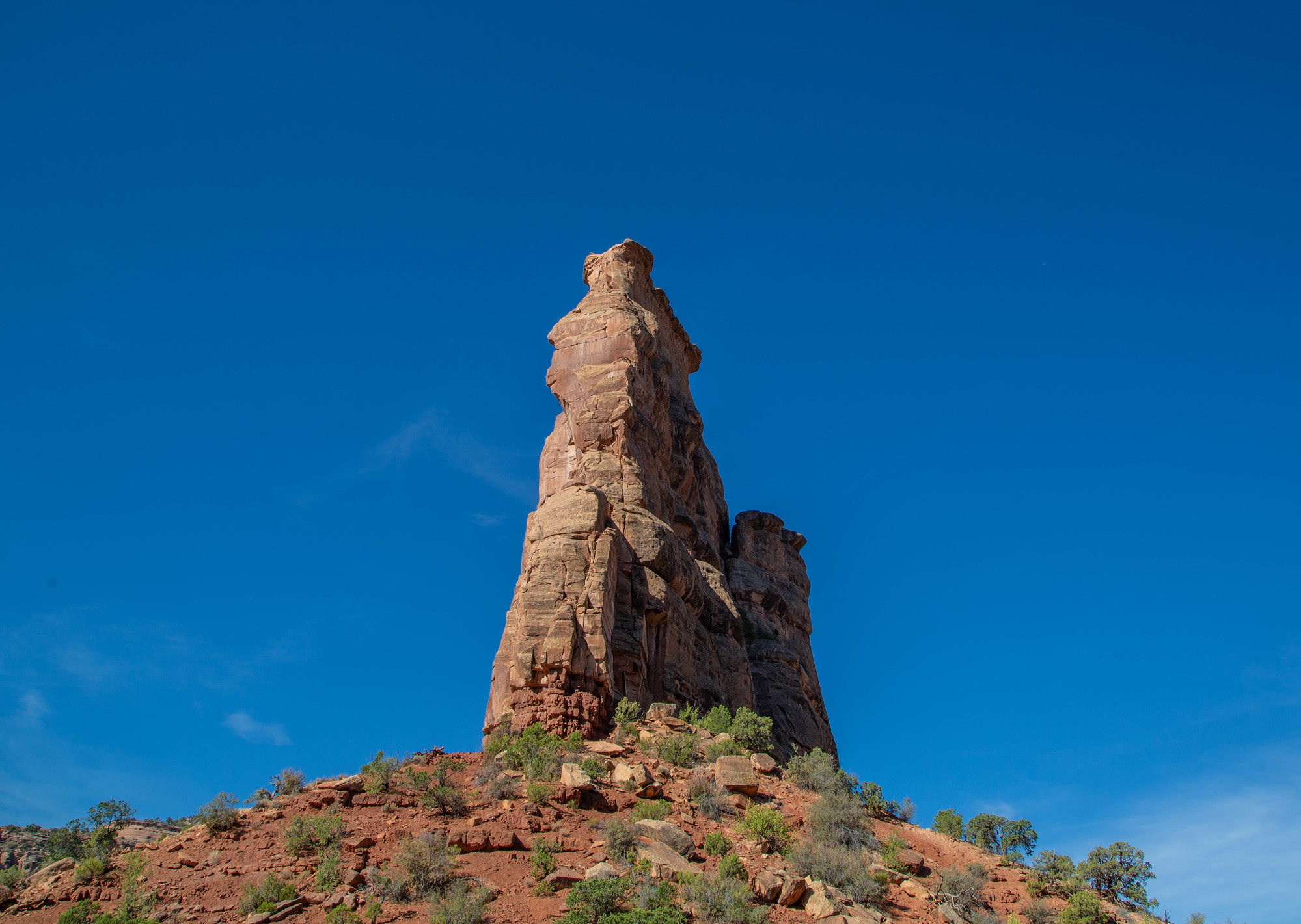 Trail leading to a tall geological formation