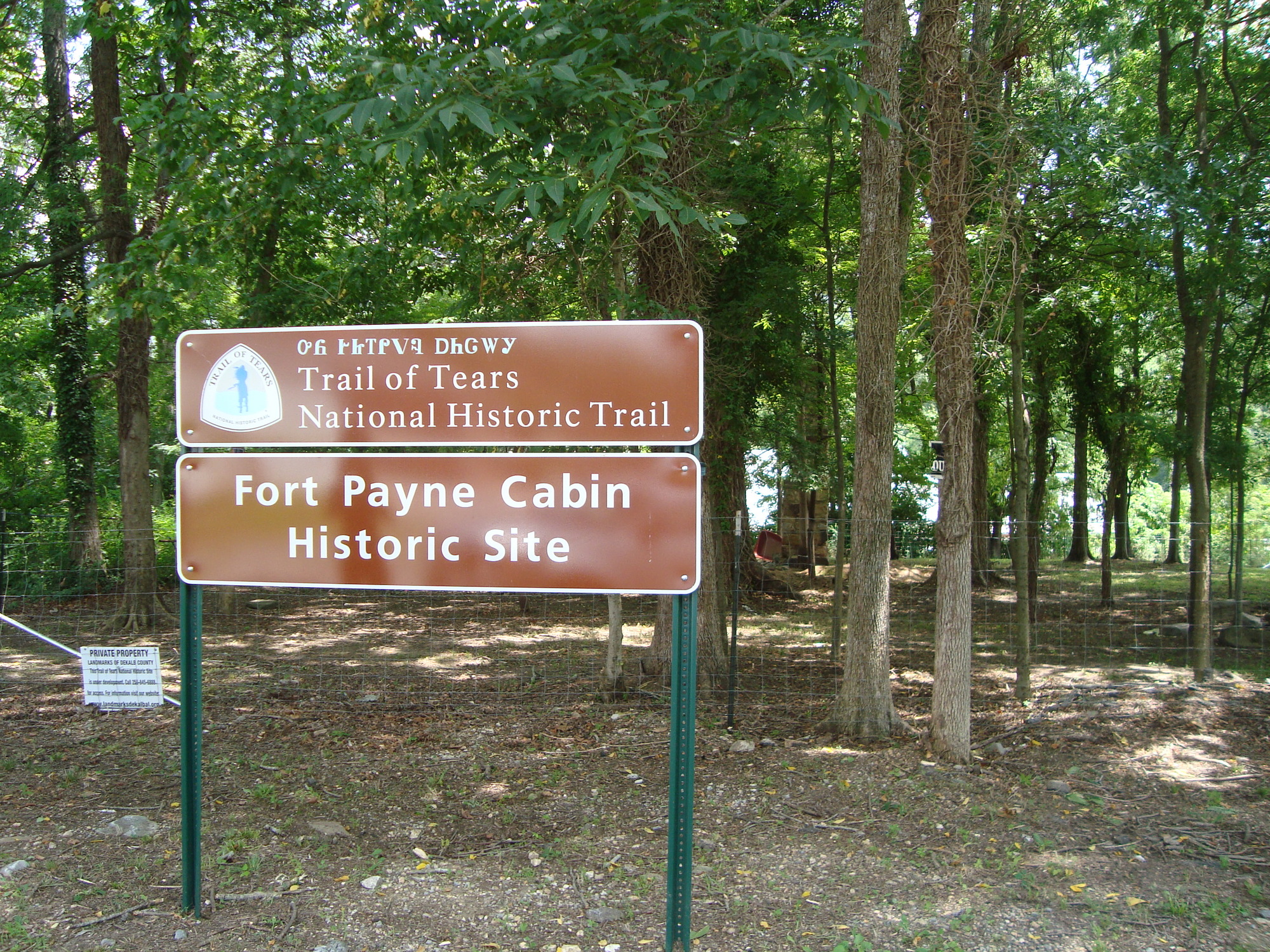 An NTIR Sign marking the location of Fort Payne Cabin Historic Site in Fort Payne, Alabama
