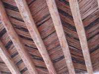 A close up of a wooden roof.