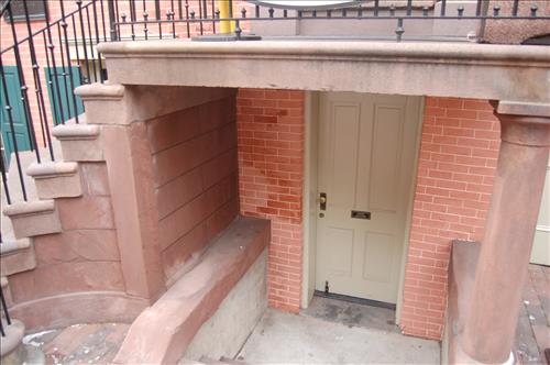 Water infiltration and damage to walls and floor of the Petersen House