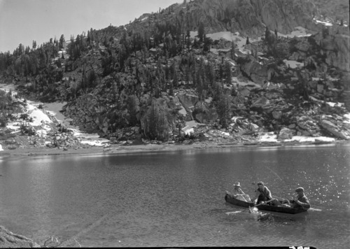These men were trolling in a collapsible boat. When asked to pose next fish caught, they said they would catch one in 20 counts. At 14 strokes of the oars one fellow caught one and the other caught his on 18.
