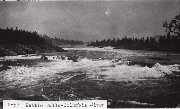 Black and white photograph of a section of rapids on a wide river