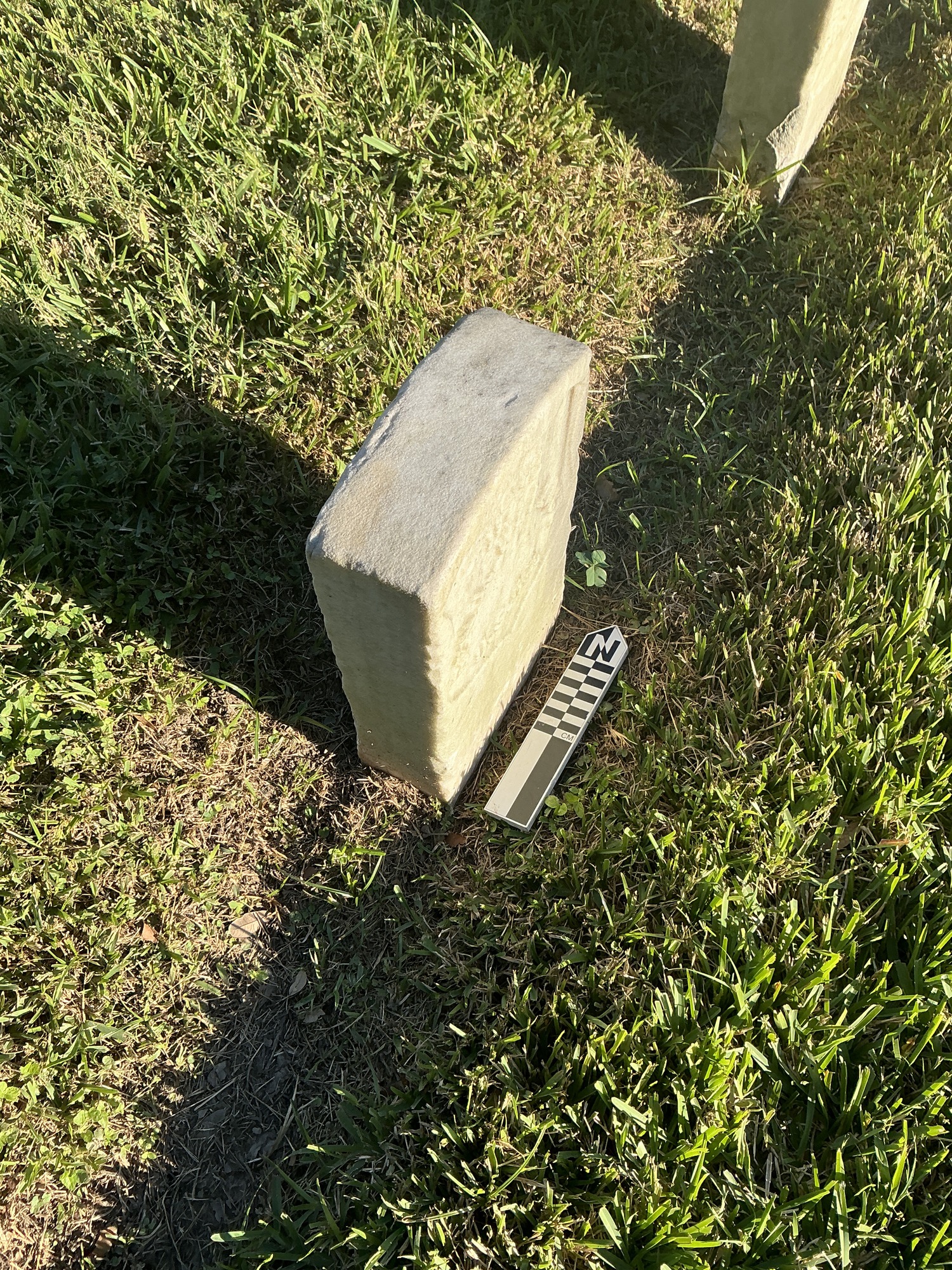 Extra image of historic upright marble headstone with recessed shield face.