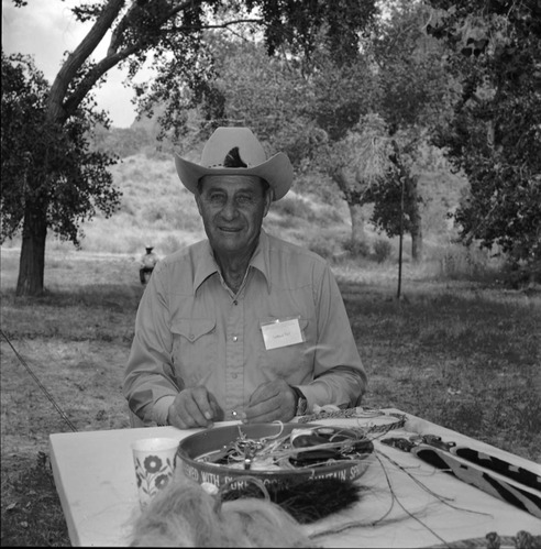 Lamond Tait with his horsehair braided belts at the third annual folk life festival at Zion National Park Nature Center, September 1979.