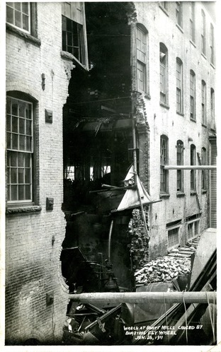 A photo showing damage caused by a flywheel exposion.