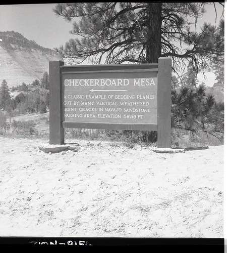 Roadside exhibit at Checkerboard Mesa overlook.