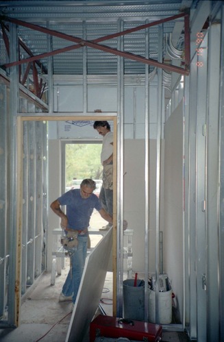 Men working on the construction of headquarters addition.