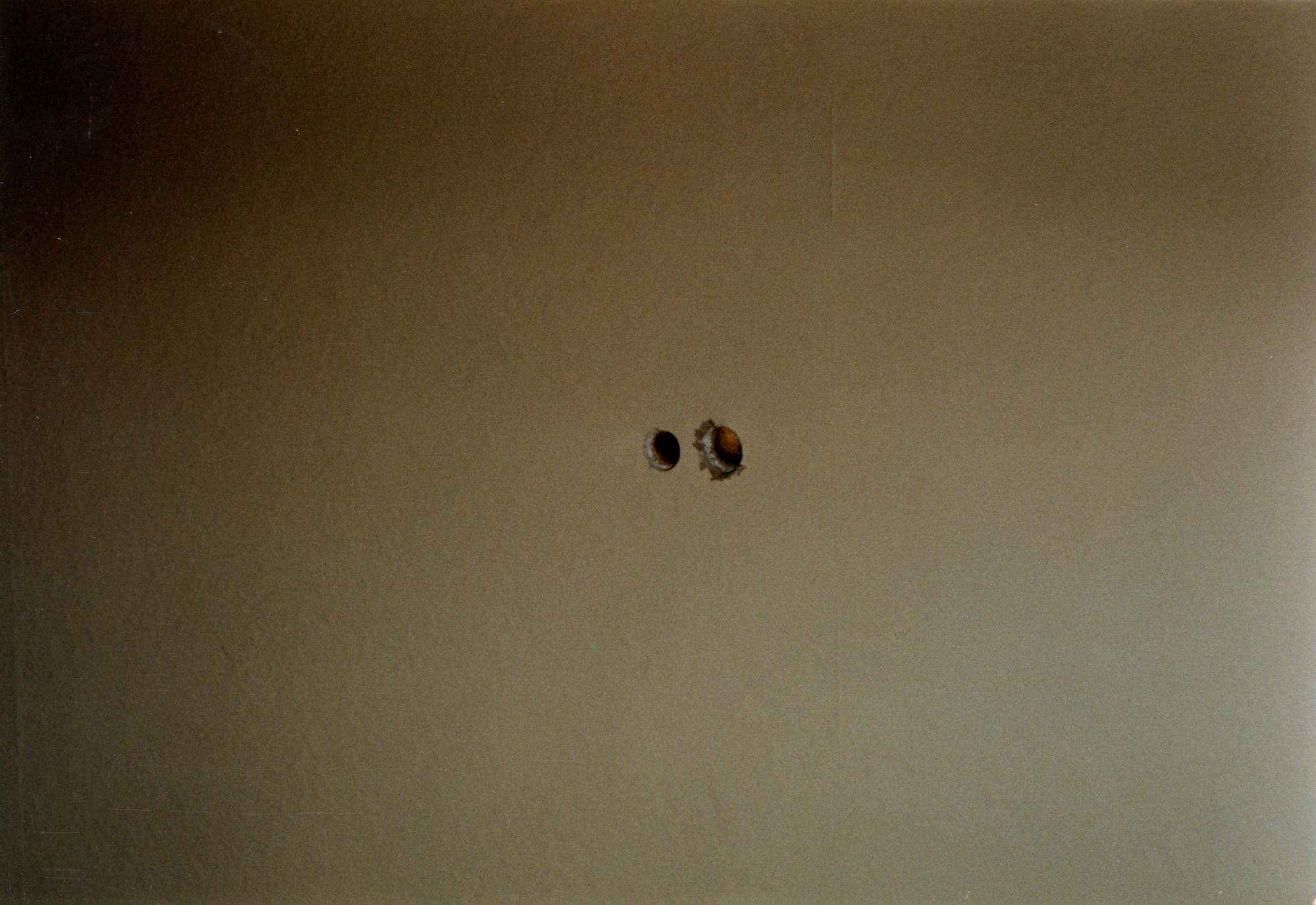 Hole in ceiling of Gates bedroom for smoke detector