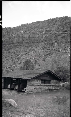 Three car garage, Building 111, with cars inside.