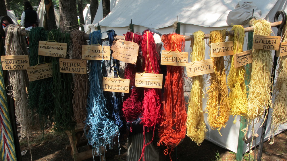 Brown to red yarn dyed with natural plant, nut and insect dyes.