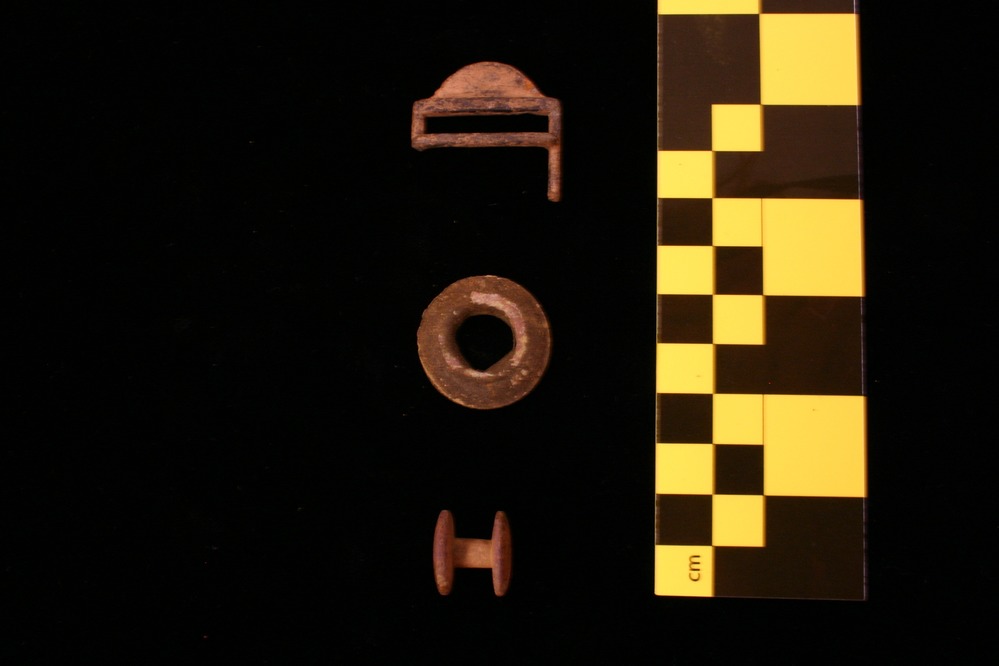 Top to Bottom: Knapsack Strap Adjuster (GWMP 643), Grommet (GWMP 518) and Rivet (GWMP 592).