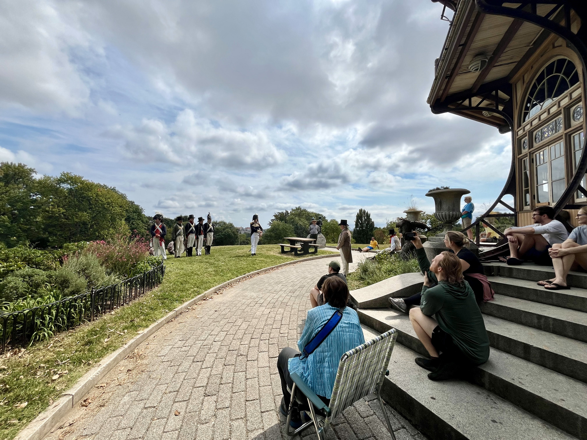 Visitors watch as living historians and rangers talk to them at Patterson Park