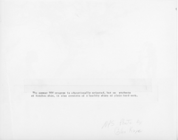 The backside of an image with three Youth Conservation Corps members clearing a tree from a lava rock wall. Towards the bottom of the image there is a caption that reads, 