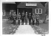 Park Personnel Group Photo. Administrative Collections: Album 9 (Miscellaneous) -LAVO personnel including Superintendent John Preston, Chief Clerk Neil Moore, Ranger Eugene Barton, and Naturalist Carl Swartzlow in front of headquarters administrative building
