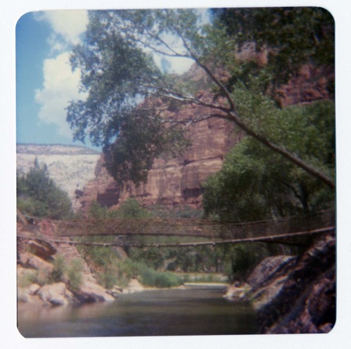 The arrival and emplacement of the new Zion Lodge footbridge. Old suspension footbridge in front of new bridge.