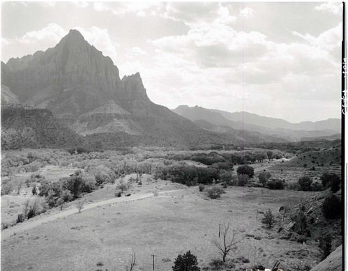 Proposed site for new Mission 66 Visitor Center and Museum looking south from ridge to north galleries and museums.