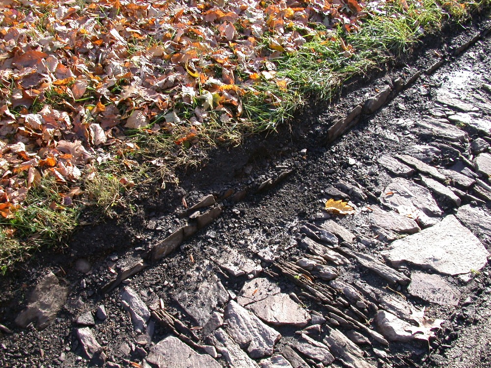 Historic road gutters after cleaning debris. This project is part of several ongoing construction and rehabilitation projects in the park.