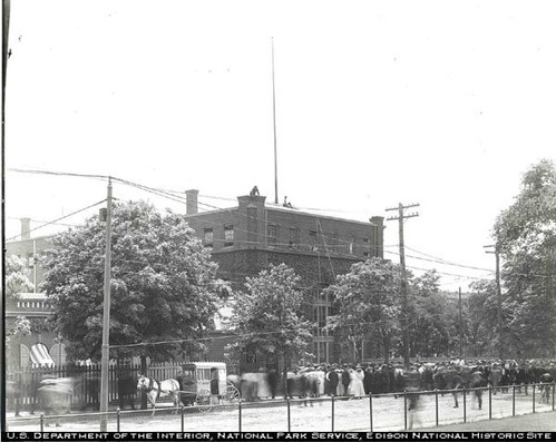 Flag raising at Laboratory - building #5, viewed from Main Street; 6/24/1912. 10.118/6
