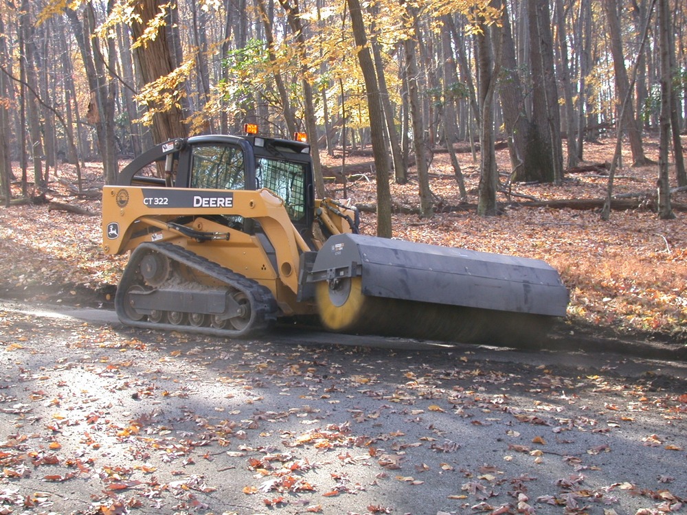 Cleaning debris from the historic road gutters. This project is part of several ongoing construction and rehabilitation projects in the park.