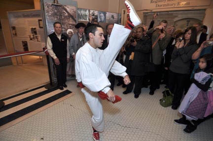 A member of the Oinkari Dancers, a group from Boise, Idaho, performs a traditional Basque welcome dance in the Great Hall as part of the opening ceremonies for "Hidden in Plain Sight: The Basques."