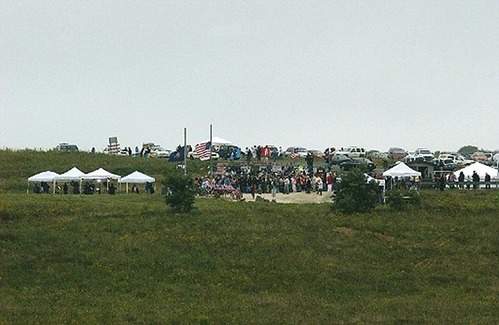 Visitors pay tribute to the 40 passengers and crew of Flight 93 at the Temporary Memorial following the 5th Anniversary Commemorative Service