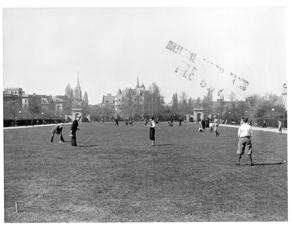Children playing croquet on the upper mall area of Meridian Hill Park.
