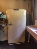 Historic refrigerator in a basement