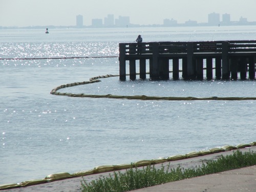 Boom around Fort Pickens Pier