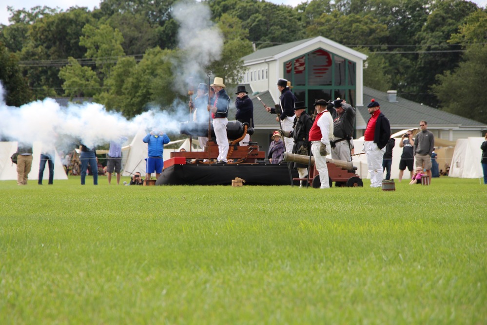 Two cannons giving a firing demostration
