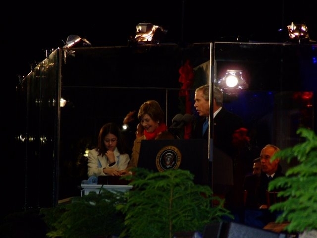 President George W. Bush and Mrs. Laura Bush are joined by tree lighters Kayleigh Kepler, 11, left, and Lindsey Van Horn, 9, during the 2008 Lighting of the National Christmas Tree Thursday, Dec. 4, 2008, on the Ellipse in Washington, D.C. President Bush is now counting down...5...4...3...2...1