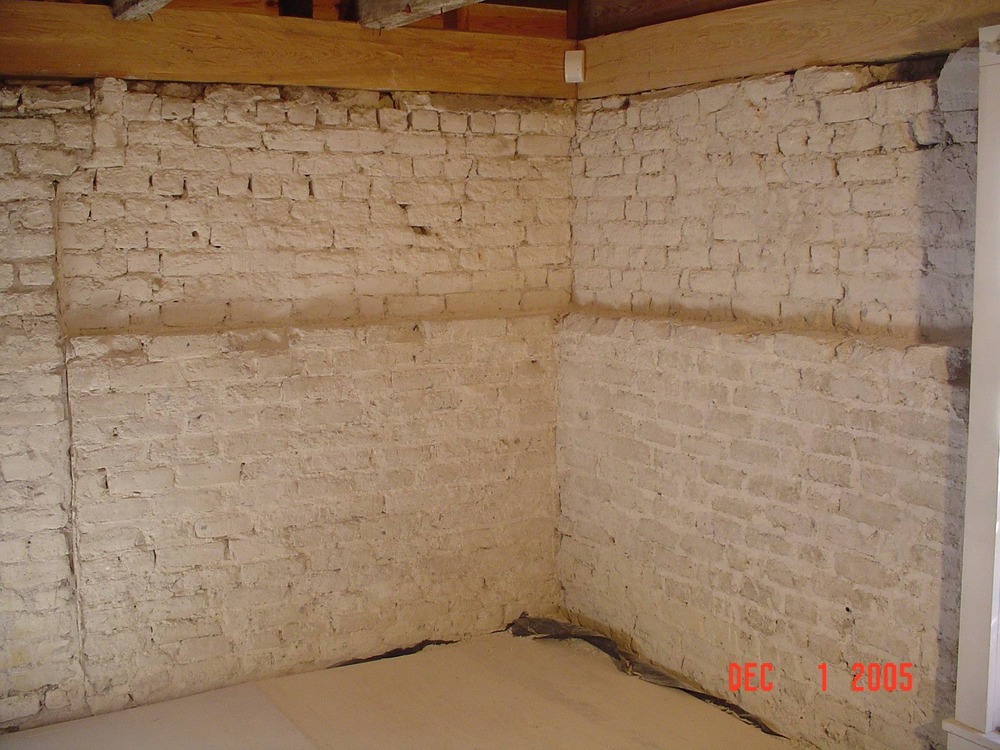 Underneath the lime surface of the walls in the southeast corner of the south room of the kitchen house the tabby brick wall structure was revealed.